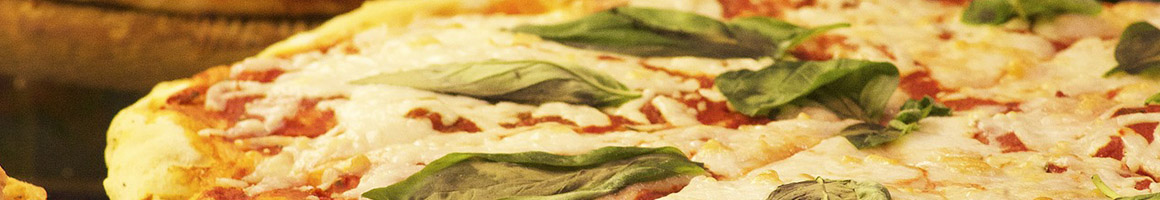 Eating Pizza at Moncheese Pizza restaurant in Surfside, FL.